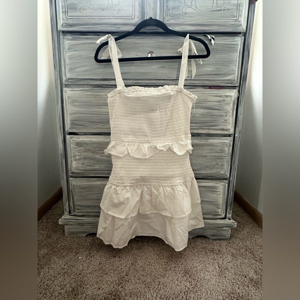White peplum dress.